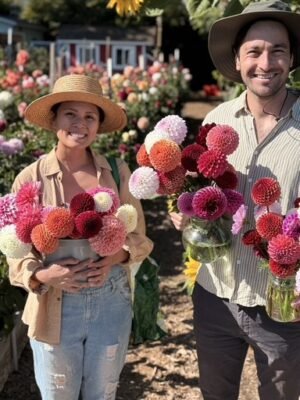 Santa Cruz flower subscription, couple with dahlia bouquets at Dynomite Farm